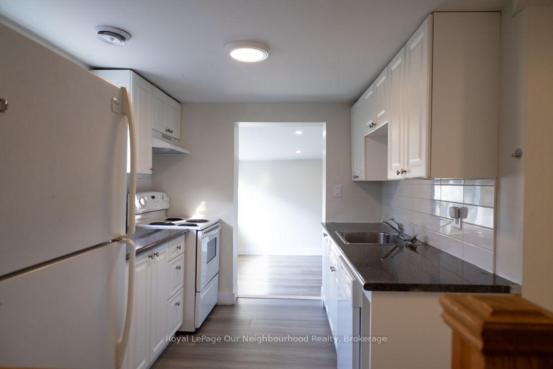 Photo 5 of Unit Unit 3, 103 Ritson Road S, Oshawa, Central — HOMEH