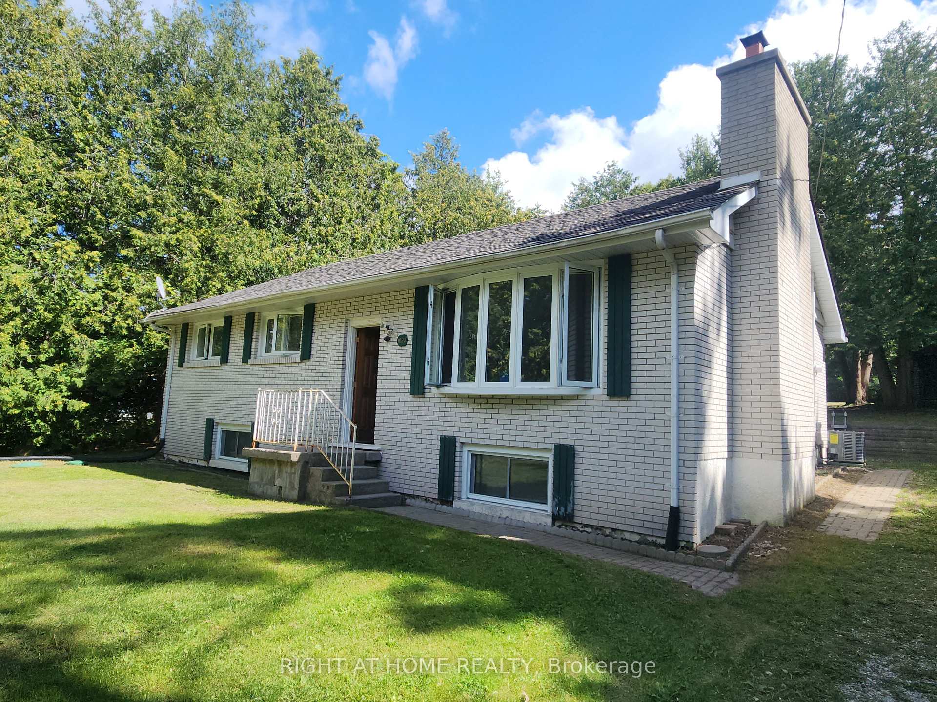 Photo 1 of 1023 Carson Road, Springwater, Midhurst — HOMEH