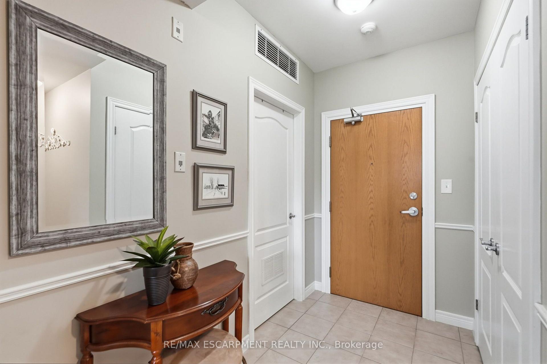 Photo 3 of Unit 202, 59 Critzia Drive, Hamilton, Rural Glanbrook — HOMEH