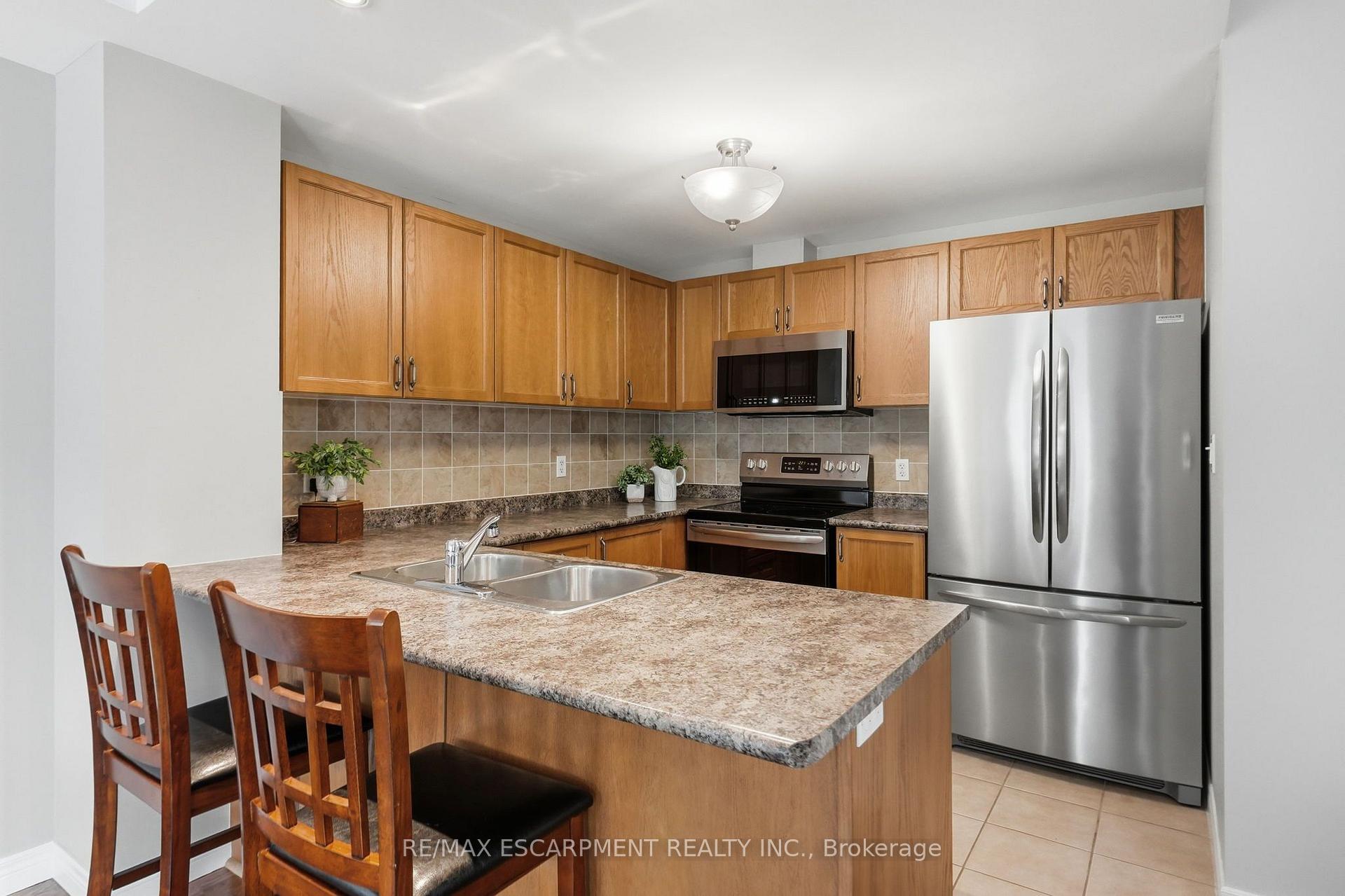 Photo 8 of Unit 202, 59 Critzia Drive, Hamilton, Rural Glanbrook — HOMEH