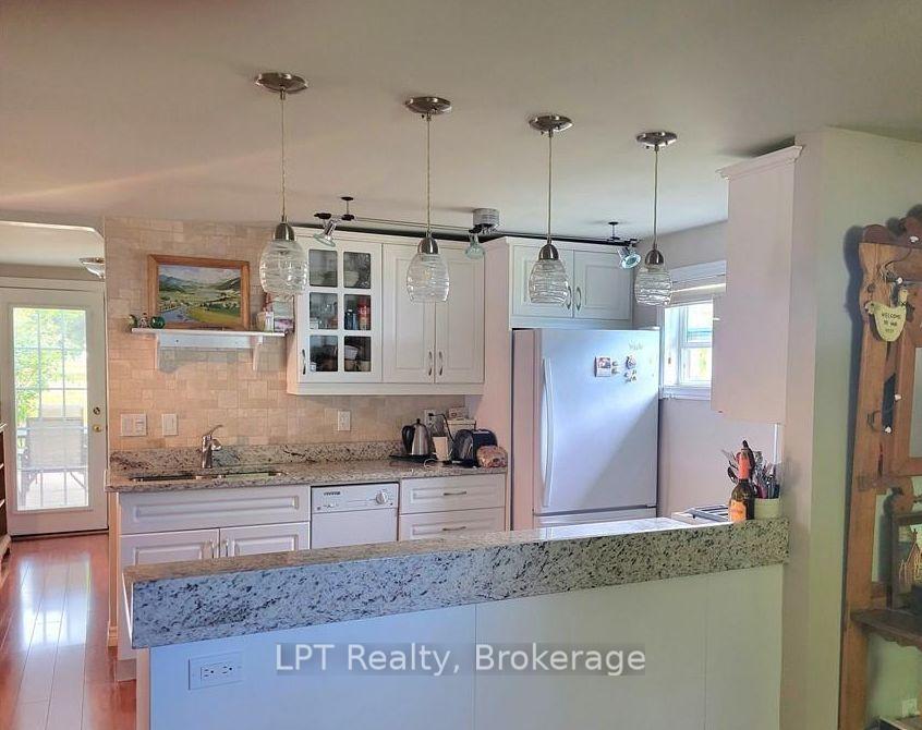 Photo 2 of 17 Bay Avenue, Prince Edward County, Ameliasburg Ward — HOMEH