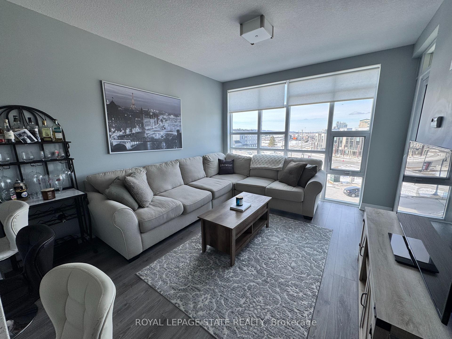 Photo 7 of Unit 404, 10 Concord Place, Grimsby, Grimsby Beach — HOMEH