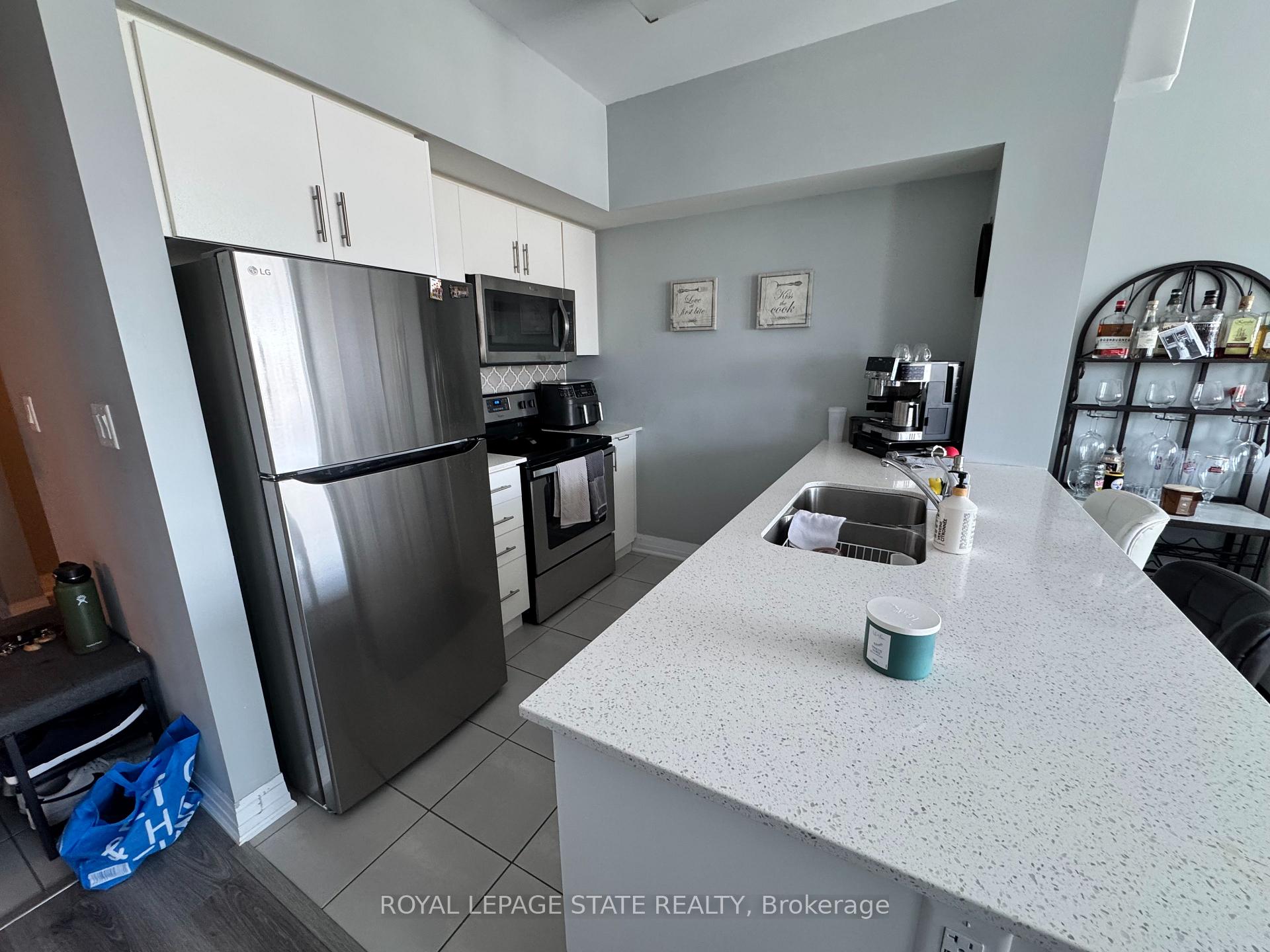 Photo 10 of Unit 404, 10 Concord Place, Grimsby, Grimsby Beach — HOMEH