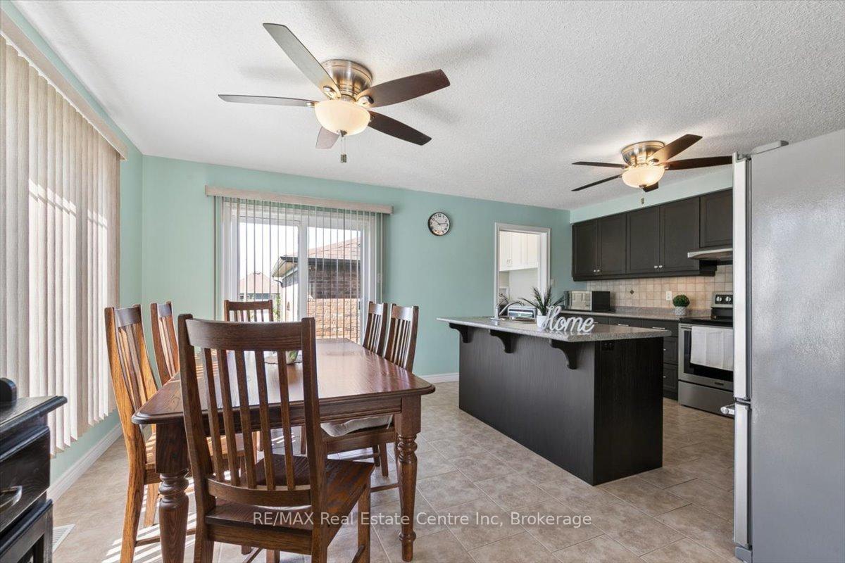 Photo 12 of 128 Ingram Drive, Guelph, Victoria North — HOMEH