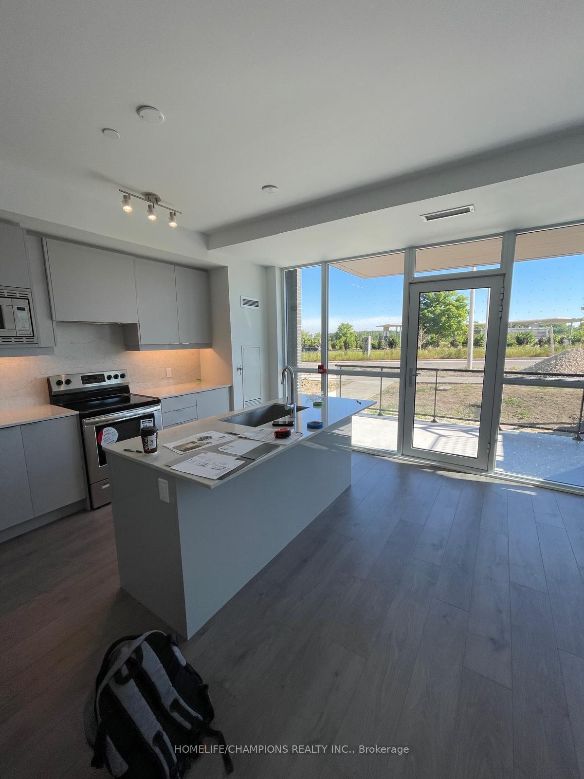 Photo 4 of Unit 5, 60 George Butchart Drive, North York, Downsview-Roding-CFB — HOMEH
