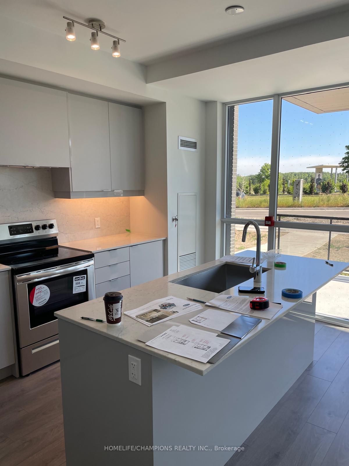 Photo 5 of Unit 5, 60 George Butchart Drive, North York, Downsview-Roding-CFB — HOMEH