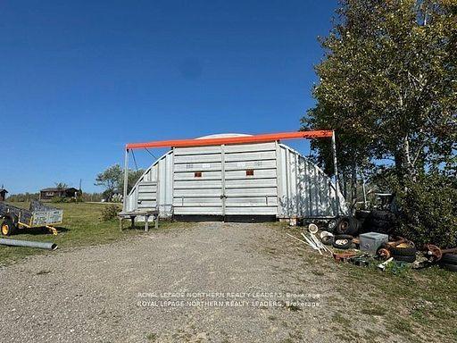 Photo 13 of 13435 101 Highway E, Timmins, TM - Outside East — HOMEH