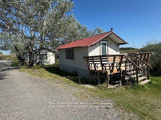 Photo 15 of 13435 101 Highway E, Timmins, TM - Outside East — HOMEH