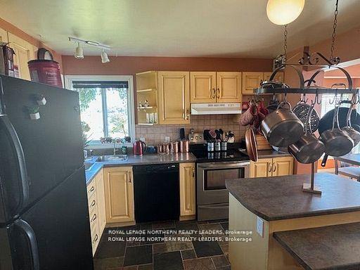 Photo 19 of 13435 101 Highway E, Timmins, TM - Outside East — HOMEH