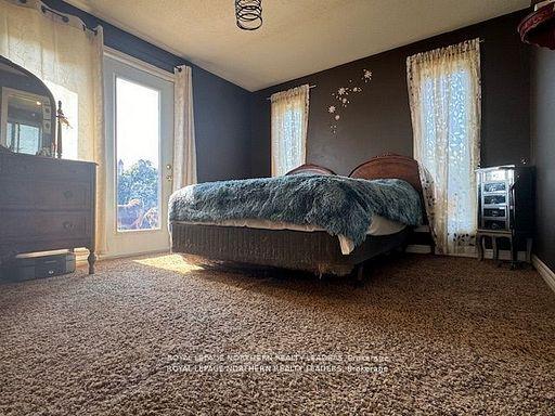 Photo 23 of 13435 101 Highway E, Timmins, TM - Outside East — HOMEH