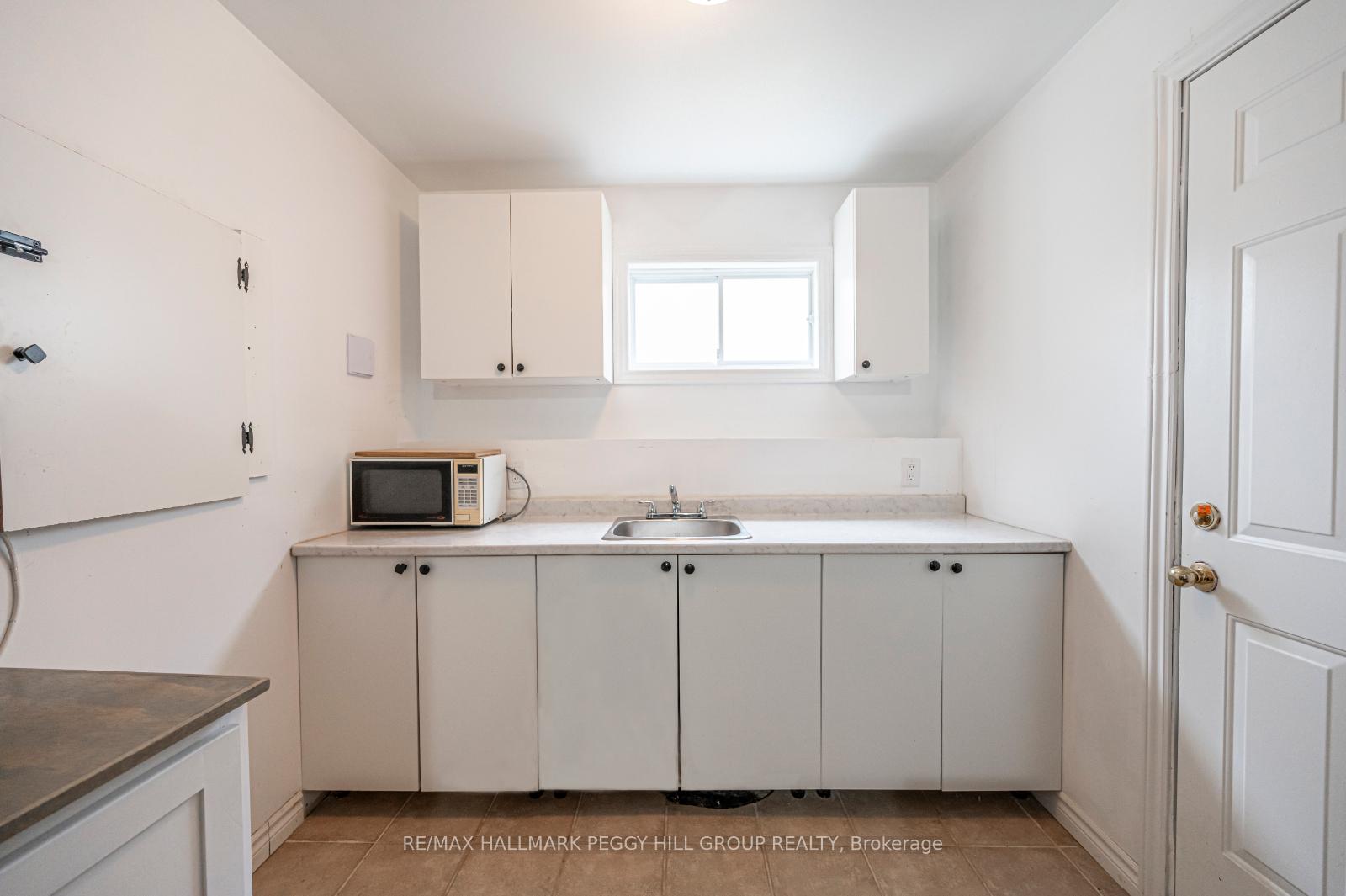 Photo 2 of Unit Lower, 32 54th Street S, Wasaga Beach — HOMEH