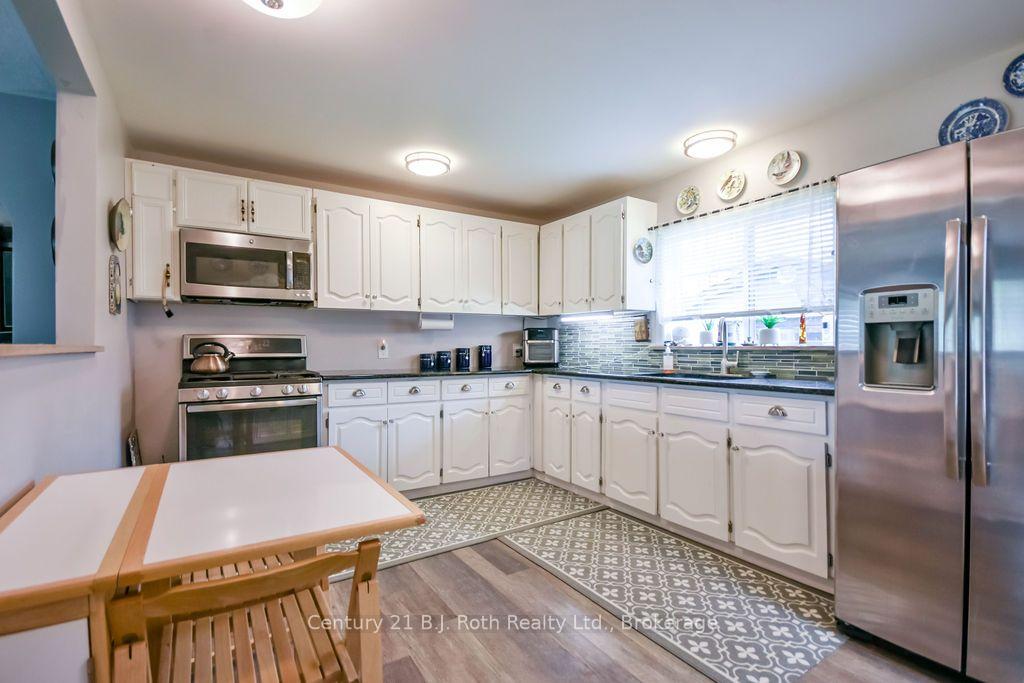Photo 8 of 976 Yonge Street, Midland — HOMEH