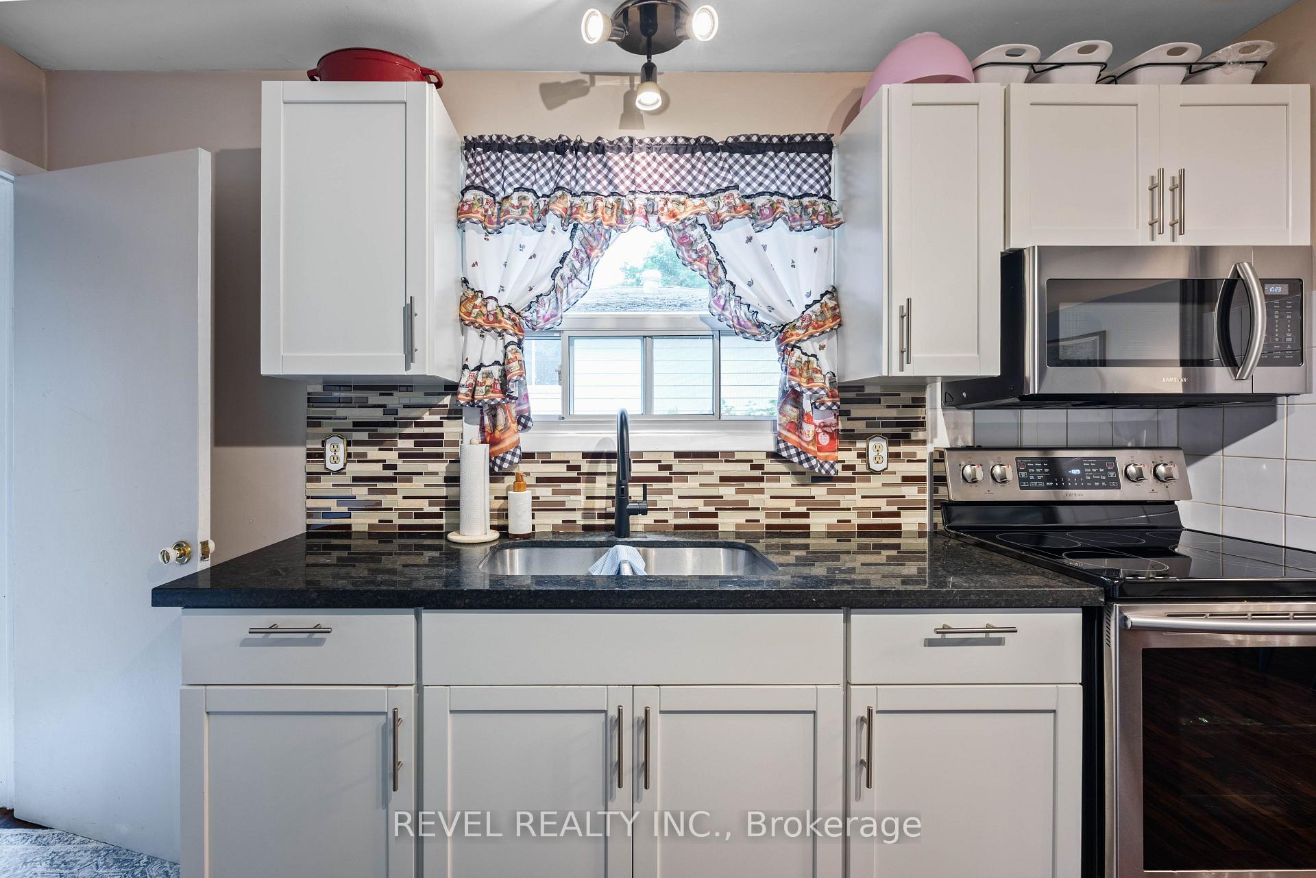 Photo 35 of 67 Carlton Drive, Orangeville — HOMEH