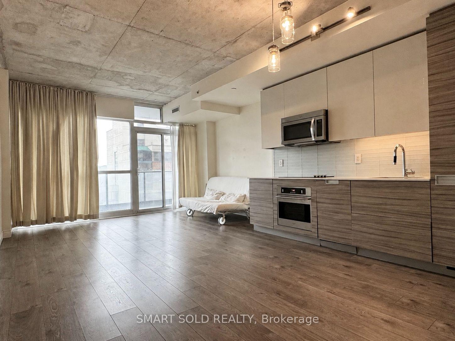 Photo 3 of Unit 1007, 210 Simcoe Street, Toronto, Kensington-Chinatown — HOMEH