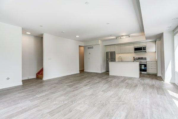 Photo 4 of Unit 120, 31 Farmstead Road, North York, St. Andrew-Windfields — HOMEH