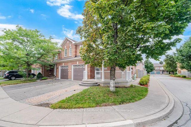 Photo 2 of Unit 12, 9900 Mclaughlin Road, Brampton, Fletcher's Creek Village — HOMEH