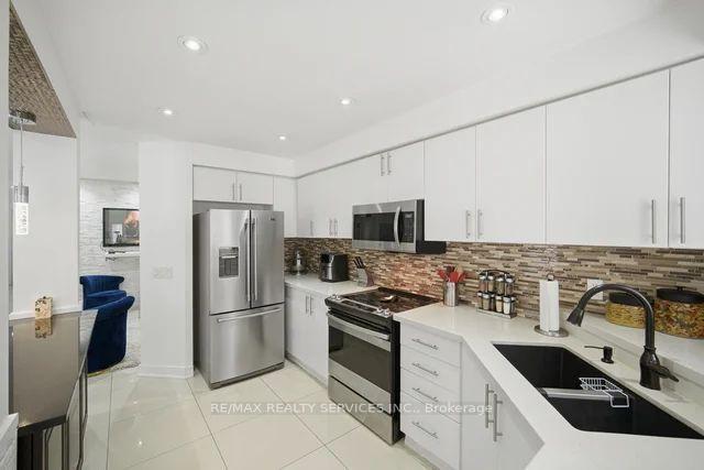 Photo 11 of Unit 12, 9900 Mclaughlin Road, Brampton, Fletcher's Creek Village — HOMEH