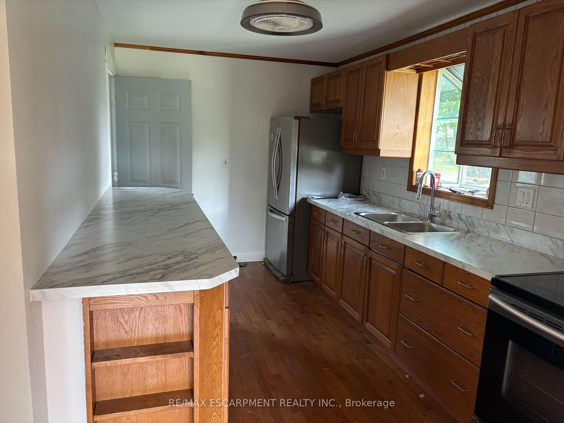 Photo 2 of Unit UPPER, 5648 Royal Manor Drive, Niagara Falls, Hospital — HOMEH