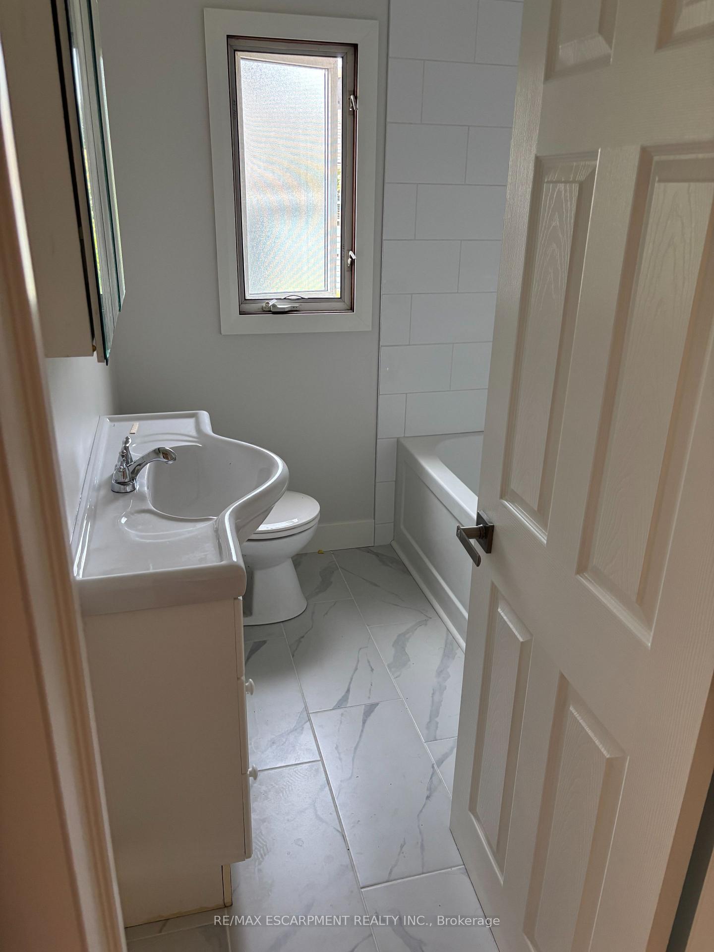 Photo 6 of Unit UPPER, 5648 Royal Manor Drive, Niagara Falls, Hospital — HOMEH