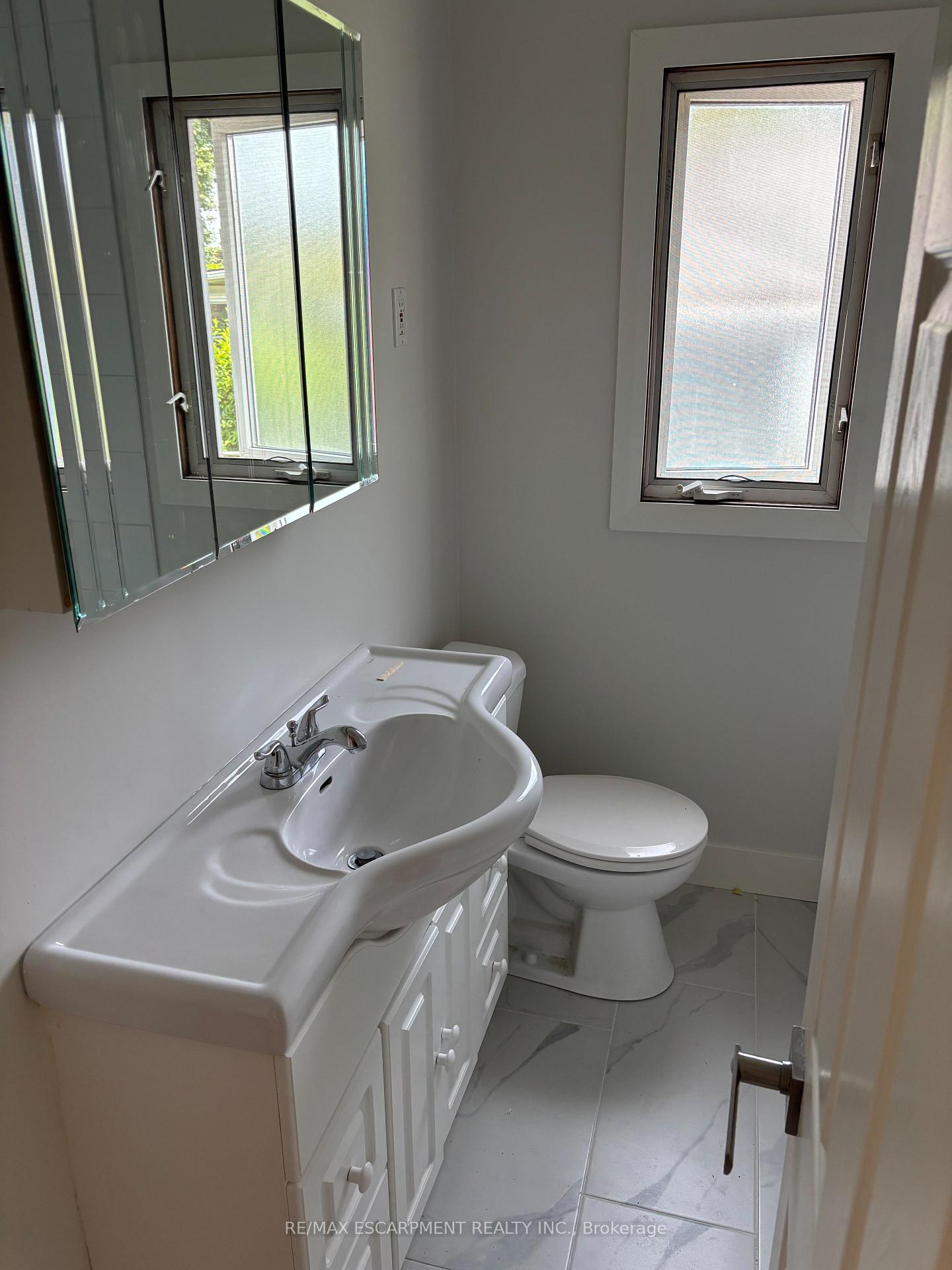 Photo 8 of Unit UPPER, 5648 Royal Manor Drive, Niagara Falls, Hospital — HOMEH