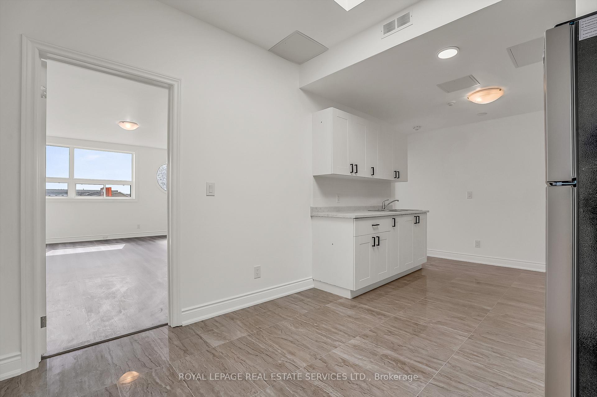 Photo 3 of Unit 301, 2820 Danforth Avenue, Toronto, East End-Danforth — HOMEH