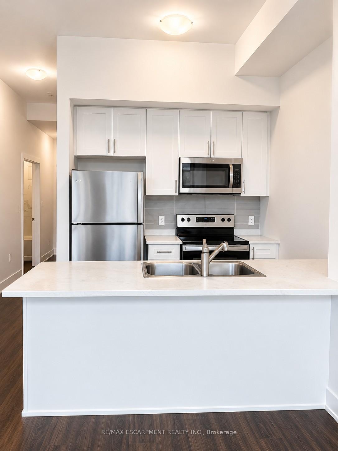 Photo 3 of Unit 103, 470 Dundas Street E, Hamilton, Waterdown — HOMEH