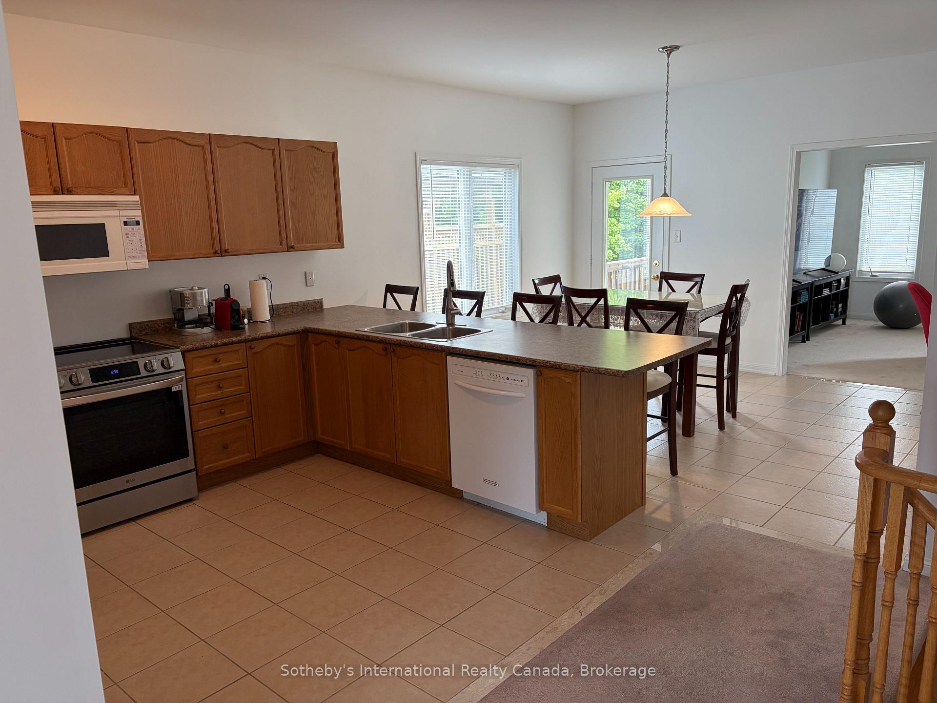Photo 9 of 71 Meadowlark Boulevard, Wasaga Beach — HOMEH