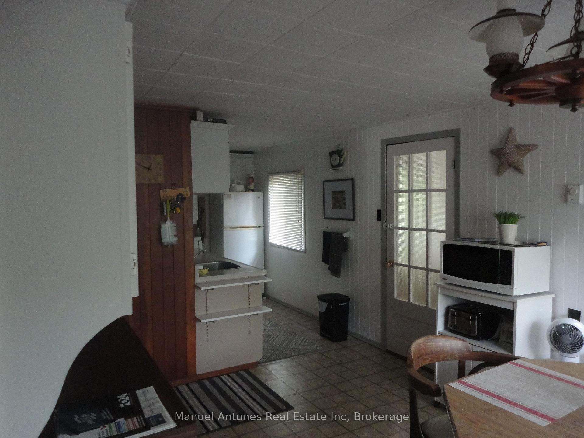Photo 7 of 1027 River Road E, Wasaga Beach — HOMEH