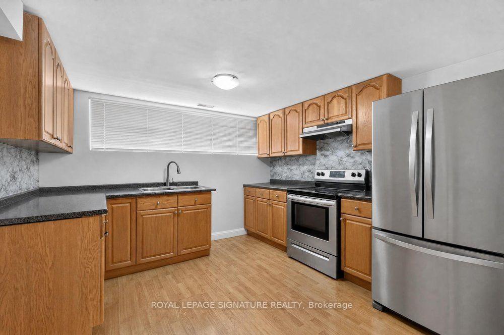 Photo 29 of 128 Trinnell Boulevard, Scarborough, Clairlea-Birchmount — HOMEH