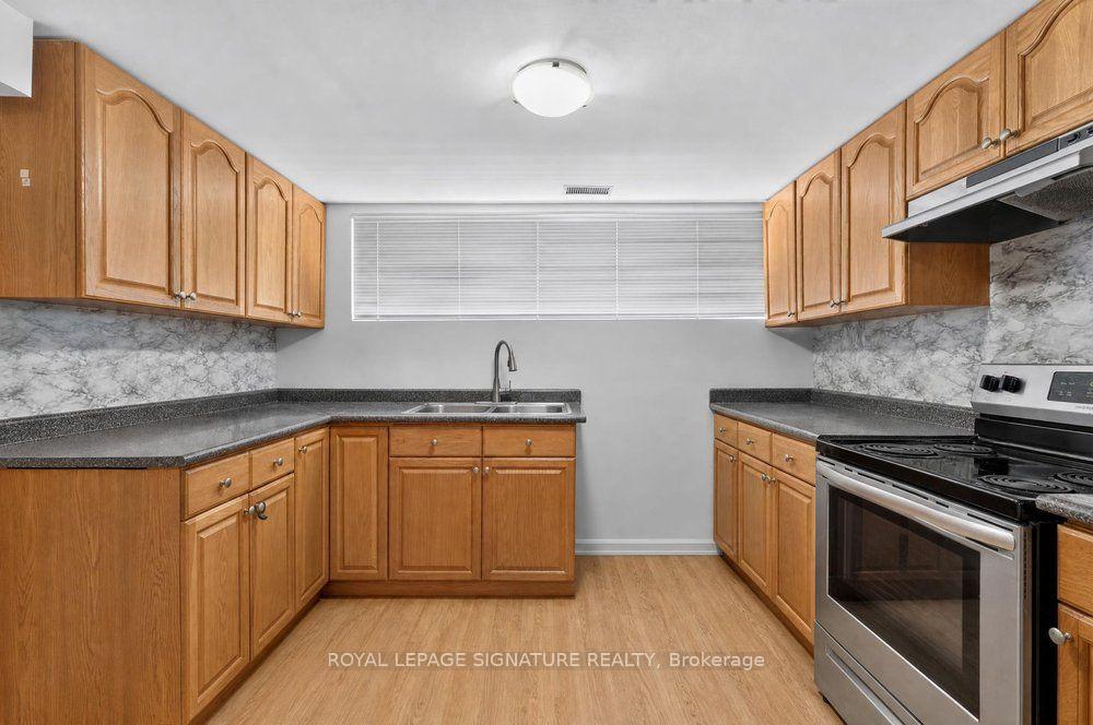 Photo 30 of 128 Trinnell Boulevard, Scarborough, Clairlea-Birchmount — HOMEH