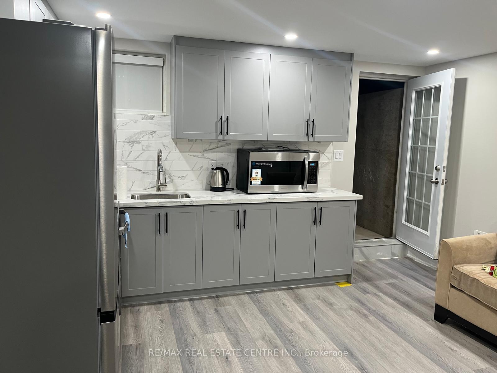 Photo 4 of Unit Basement, 1050 Farmstead Drive, Milton, Willmott — HOMEH