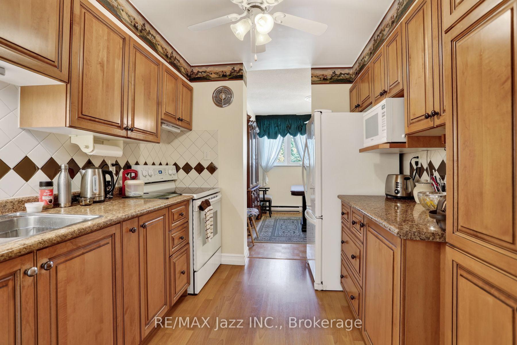 Photo 21 of Unit 305, 363 Simcoe Street N, Oshawa, O'Neill — HOMEH