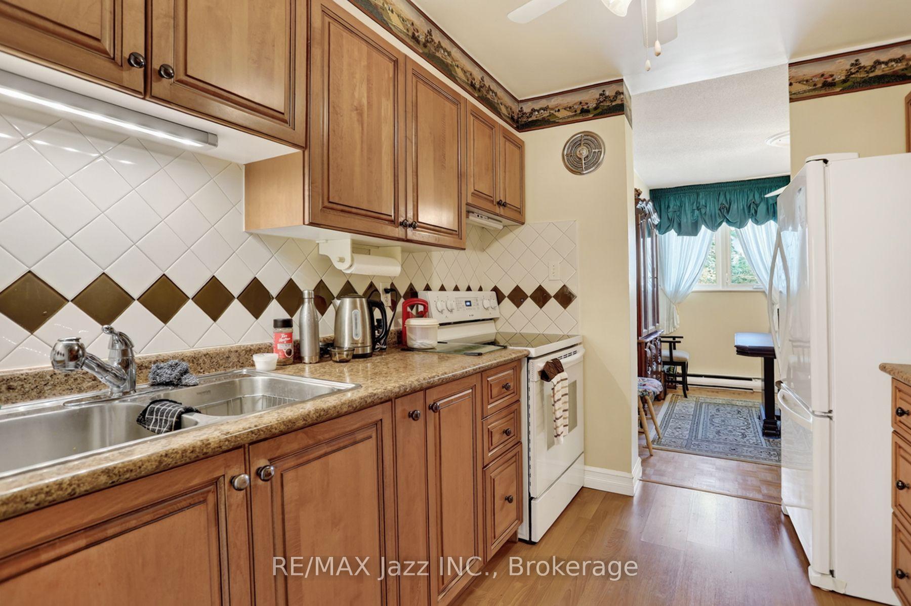 Photo 23 of Unit 305, 363 Simcoe Street N, Oshawa, O'Neill — HOMEH
