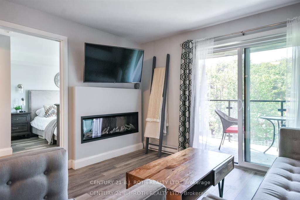 Photo 6 of Unit 406, 80 Horseshoe Boulevard, Oro-Medonte, Horseshoe Valley — HOMEH
