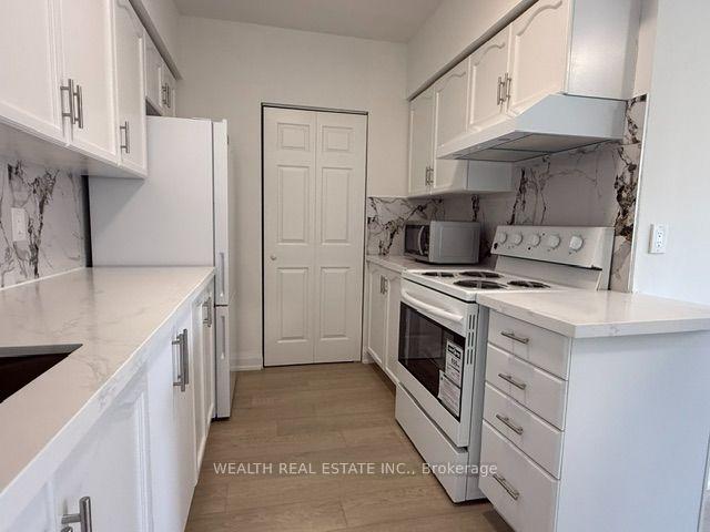Photo 6 of Unit 102, 7378 Yonge Street, Vaughan, Crestwood-Springfarm-Yorkhill — HOMEH