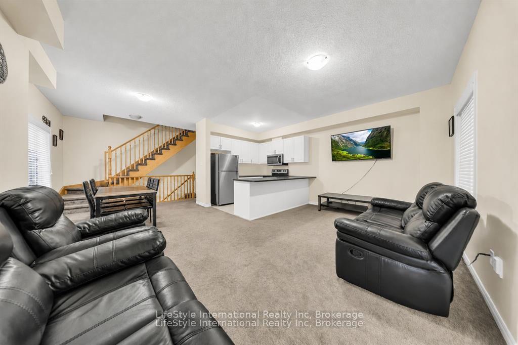 Photo 4 of Unit 87, 88 Decorso Drive, Guelph, Kortright East — HOMEH