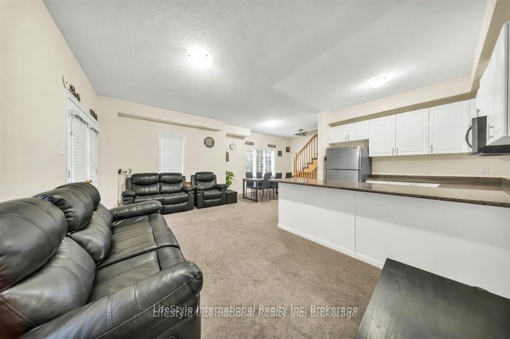 Photo 5 of Unit 87, 88 Decorso Drive, Guelph, Kortright East — HOMEH