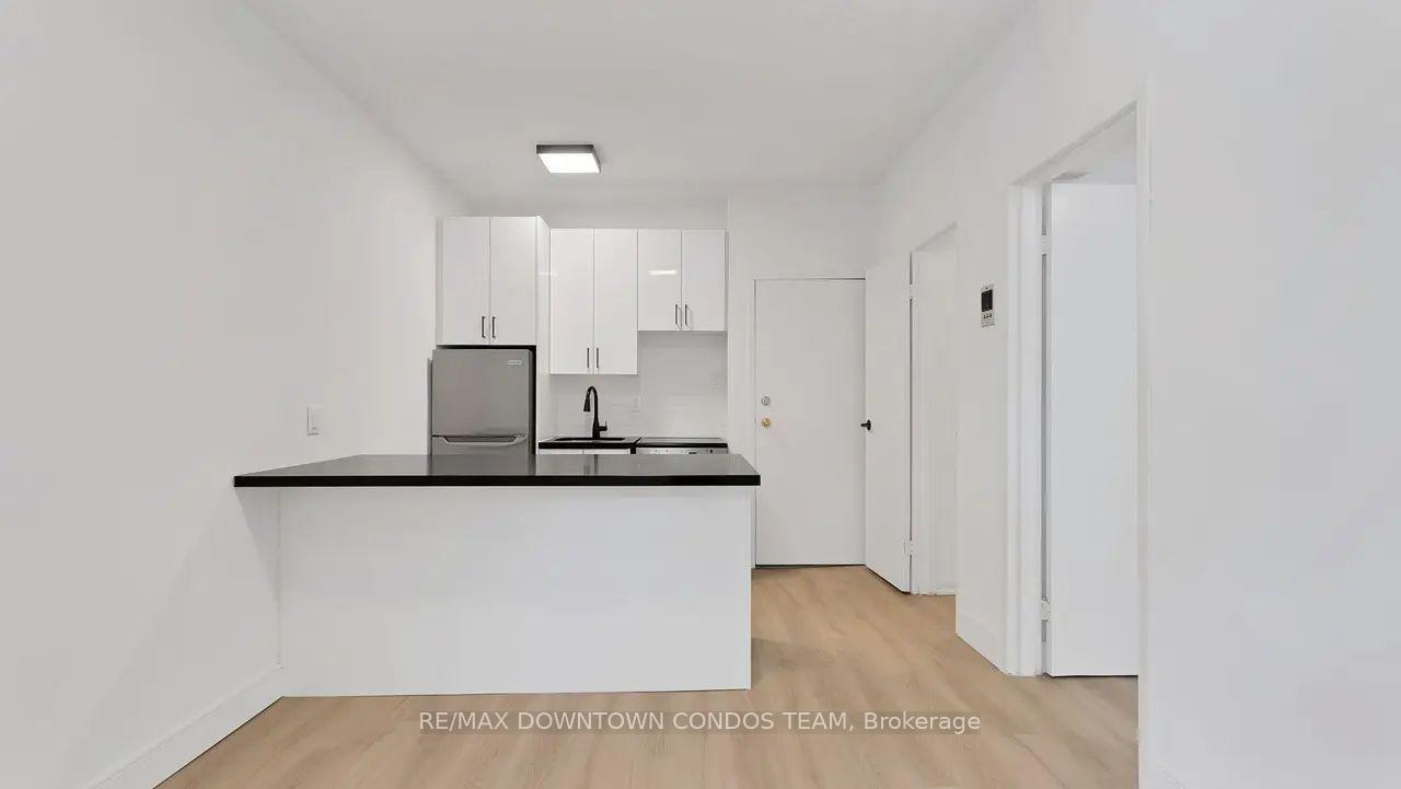 Photo 6 of Unit 101, 7 Thornburn Avenue, Toronto, South Parkdale — HOMEH