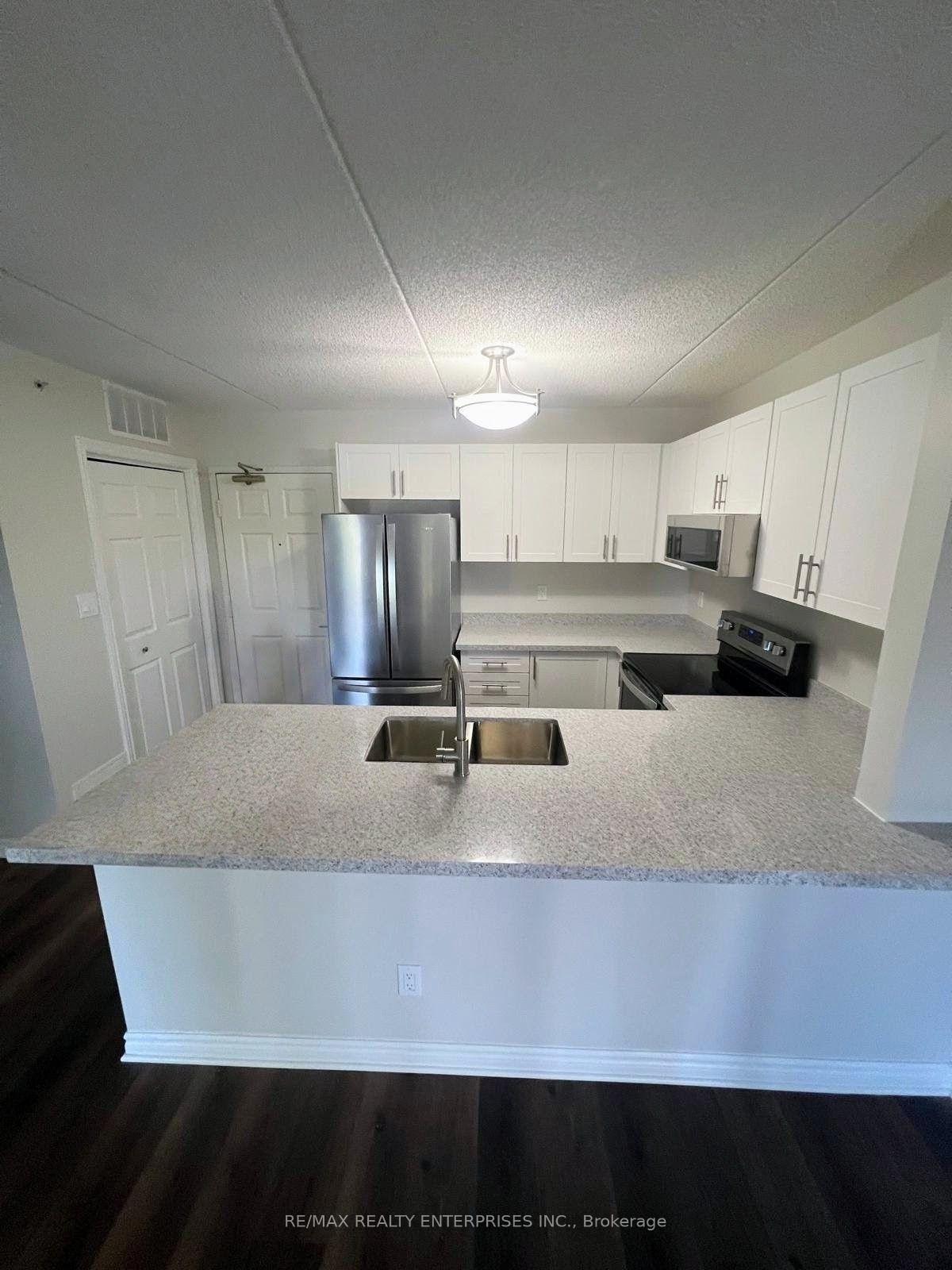 Photo 4 of Unit 209, 2035 Appleby Line, Burlington, Uptown — HOMEH