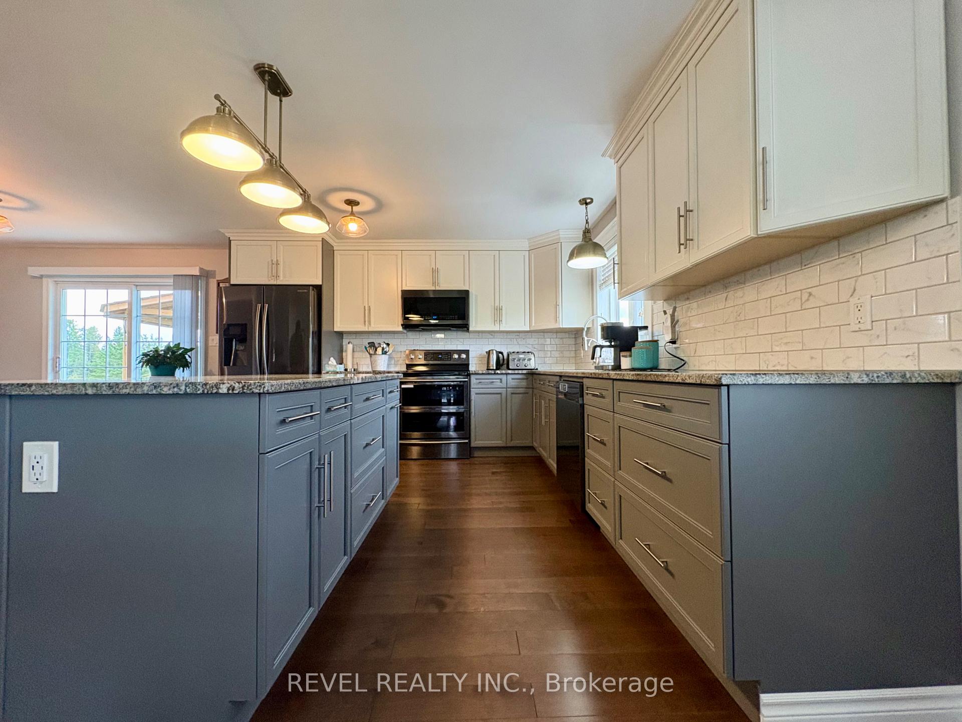 Photo 6 of 226 Hanna Road, Cochrane — HOMEH