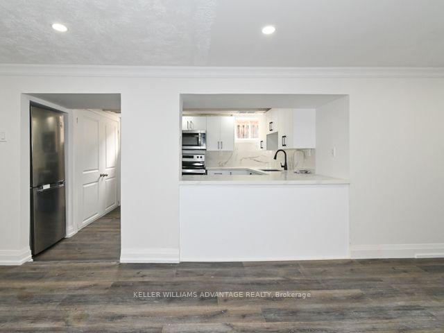 Photo 5 of Unit Lower Unit, 61 Maybourne Avenue, Scarborough, Clairlea-Birchmount — HOMEH