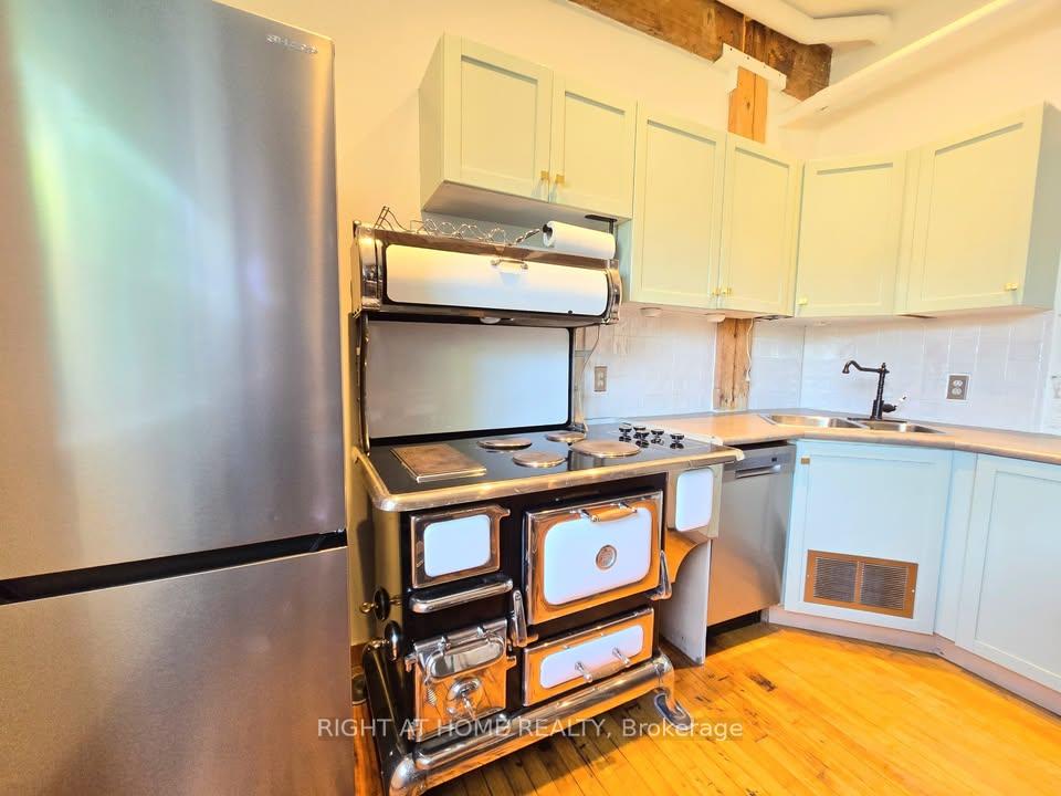 Photo 5 of Unit 12, 121 Prescott Avenue, Toronto, Weston-Pellam Park — HOMEH