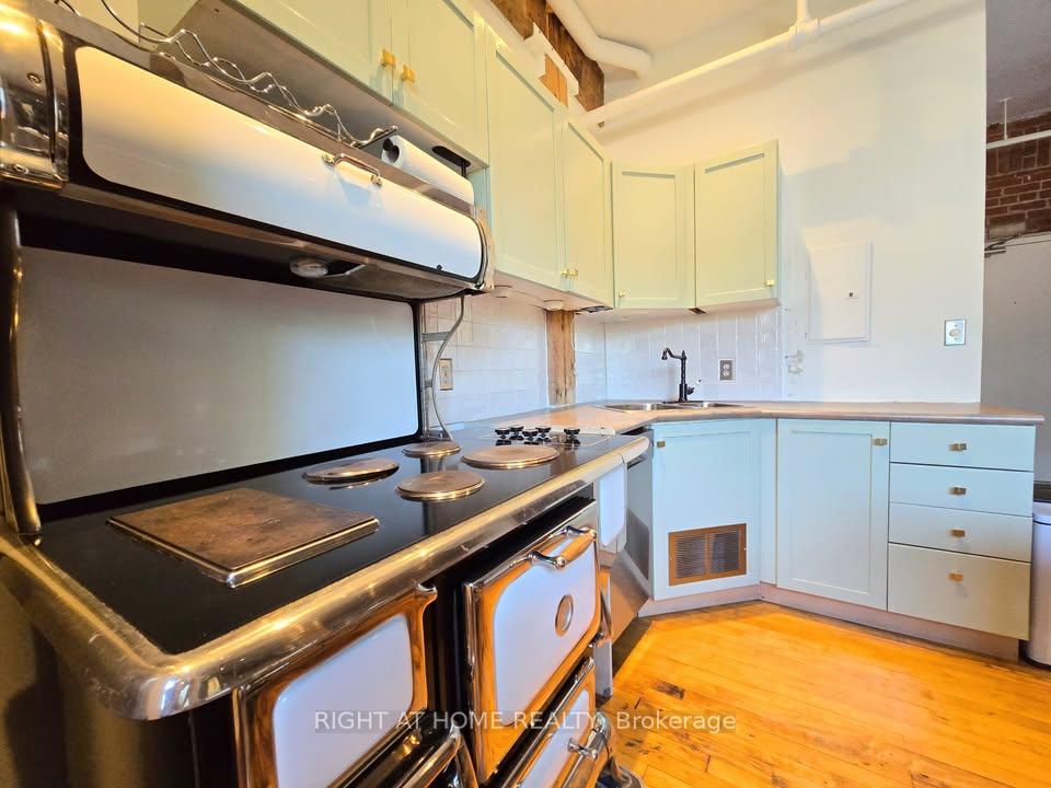 Photo 6 of Unit 12, 121 Prescott Avenue, Toronto, Weston-Pellam Park — HOMEH