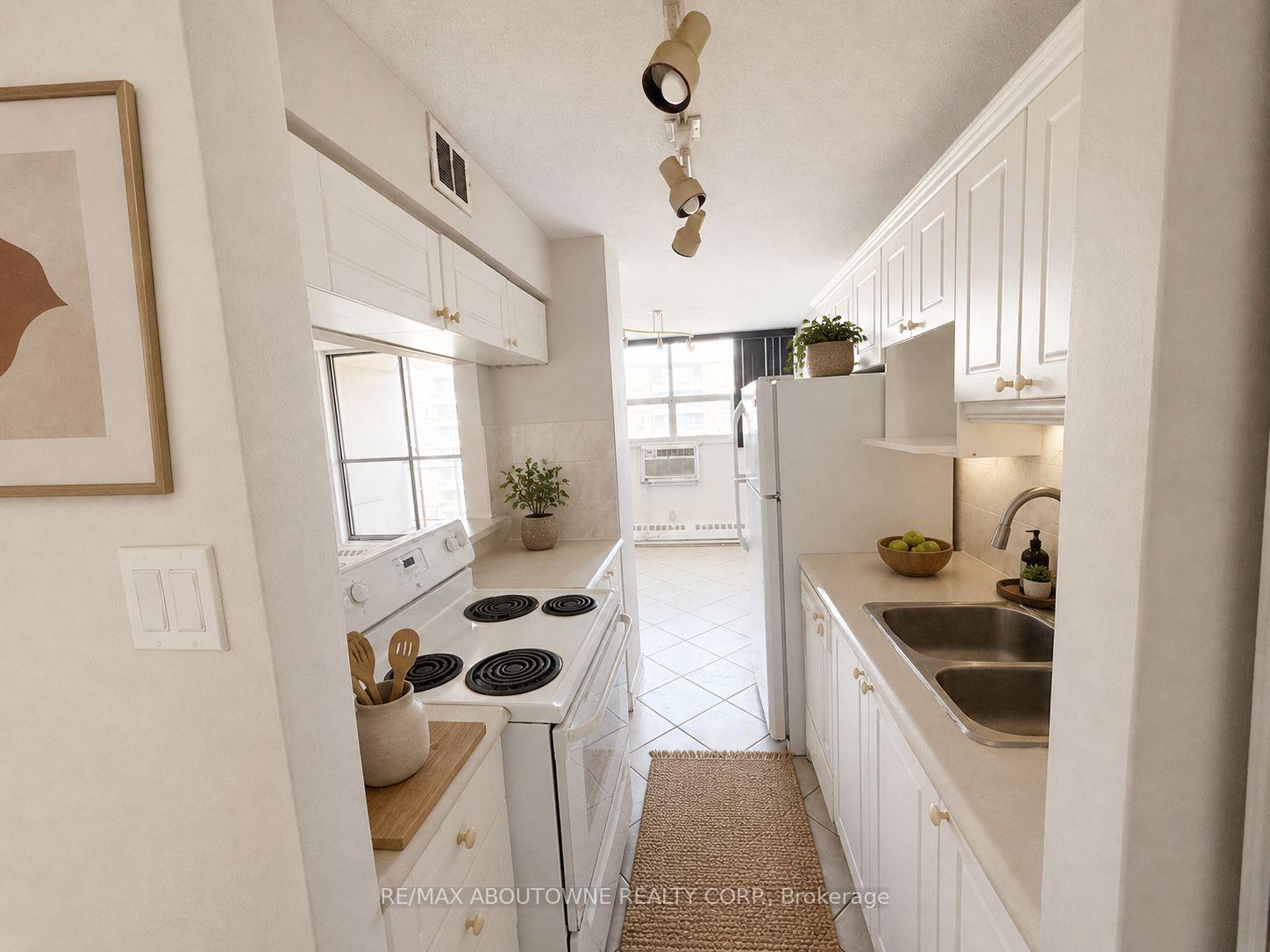 Photo 5 of Unit 1003, 1950 Main Street W, Hamilton, Ainslie Wood — HOMEH