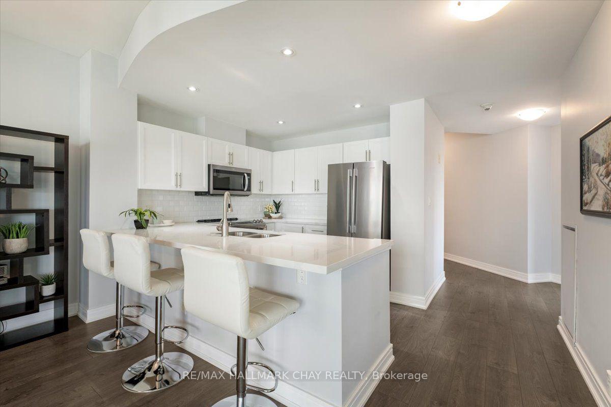 Photo 8 of Unit 605, 2 Toronto Street, Barrie, Lakeshore — HOMEH