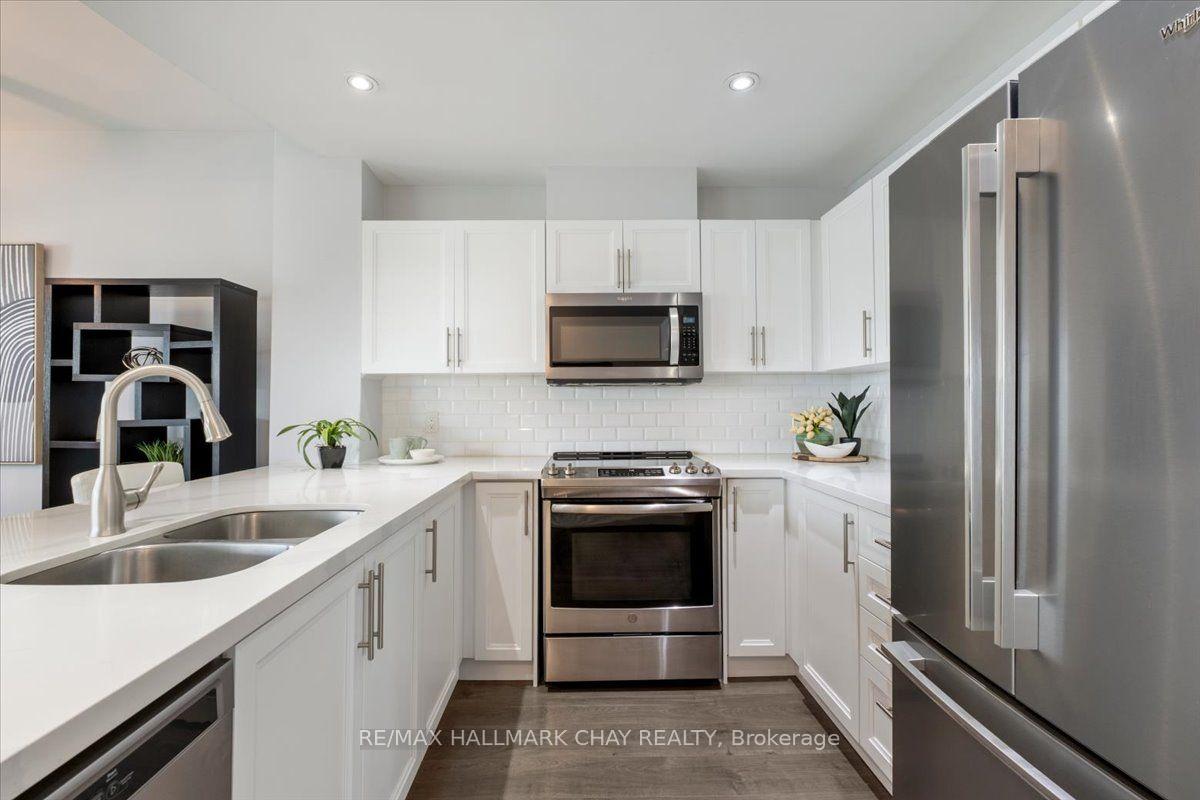 Photo 10 of Unit 605, 2 Toronto Street, Barrie, Lakeshore — HOMEH