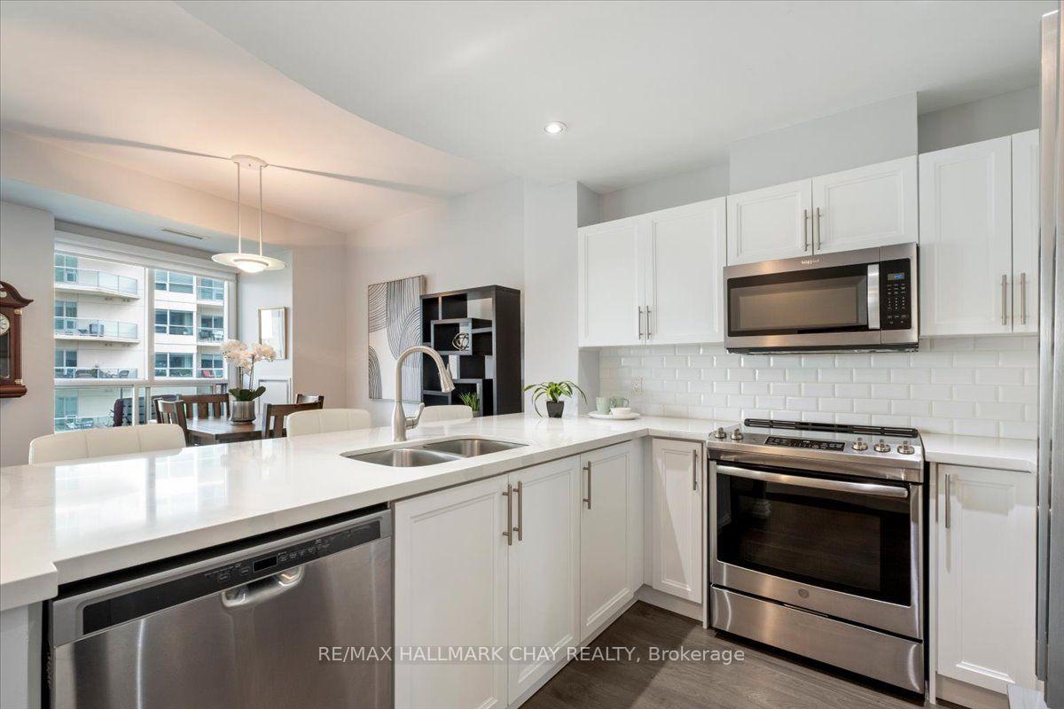 Photo 11 of Unit 605, 2 Toronto Street, Barrie, Lakeshore — HOMEH