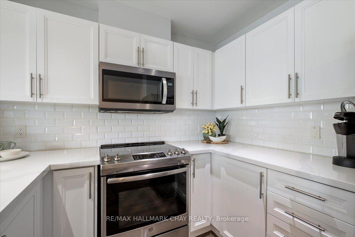 Photo 12 of Unit 605, 2 Toronto Street, Barrie, Lakeshore — HOMEH