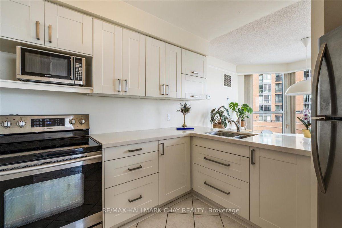 Photo 10 of Unit 407, 140 Dunlop Street E, Barrie, Lakeshore — HOMEH