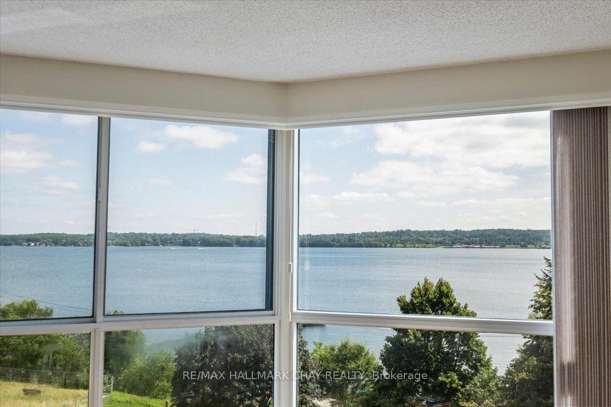 Photo 37 of Unit 407, 140 Dunlop Street E, Barrie, Lakeshore — HOMEH